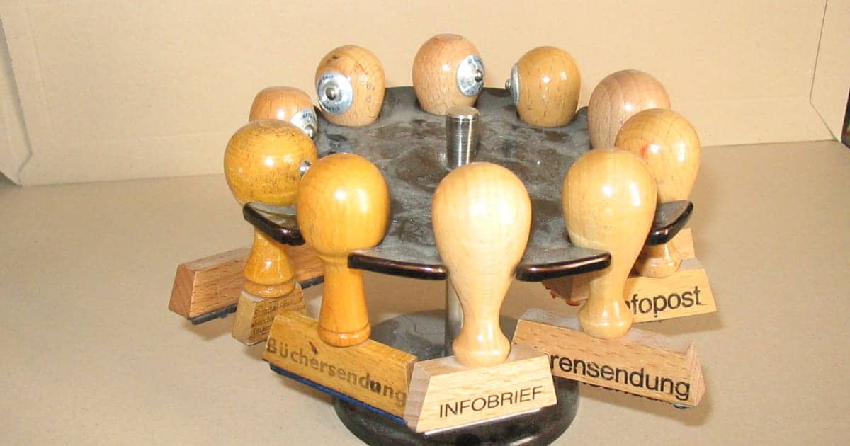 Rack of rubber stamps used to certify official documents