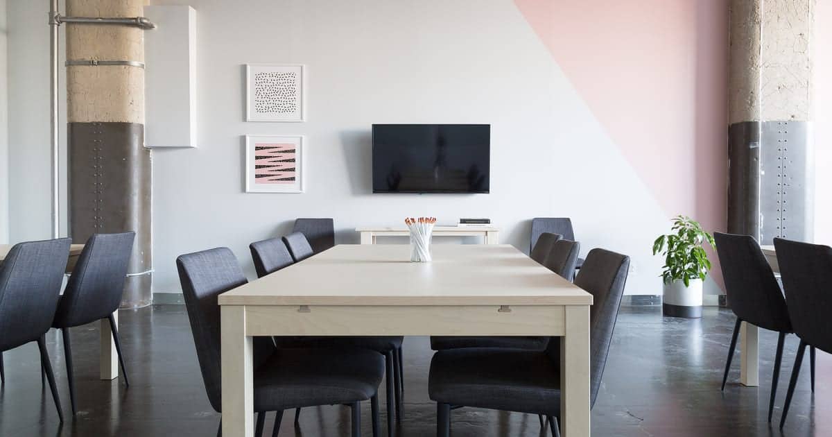 Empty company meeting room ready for a team briefing